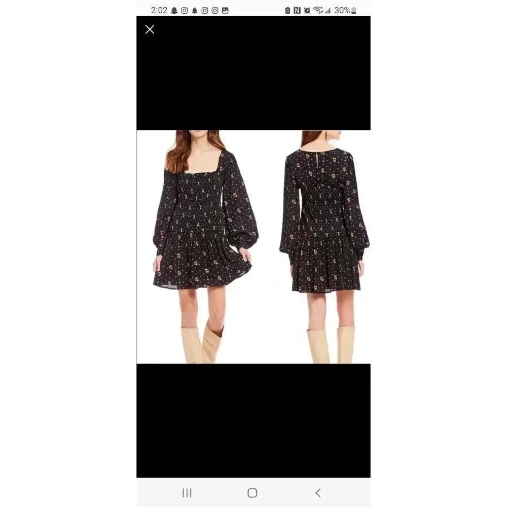 Free People Two Faces Smocked Bodice Floral Mini Dress Long Sleeved Size XS.